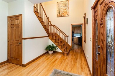Step into the bright foyer that is partially 2 sto