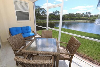 Sunroom / solarium with a water view