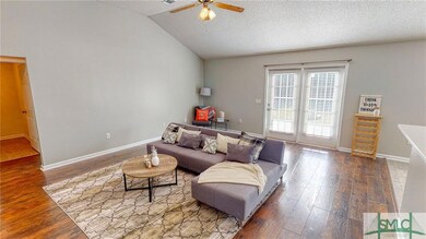 French Doors lead to the Backyard