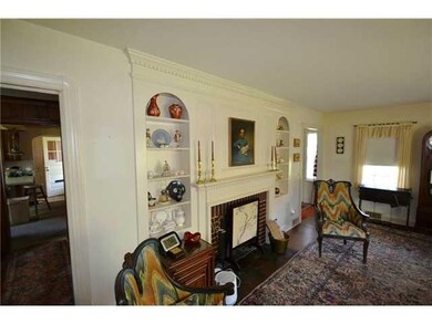 Living Room. Ornate dentil molding accents firepla