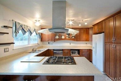Beautifully remodeled kitchen with Corian counter 