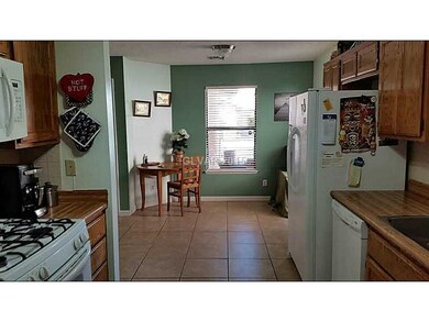 Property Photo. Beautiful Tiled flooring!! All app
