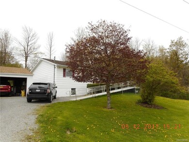 Exterior front.  Handicap ramp will be removed