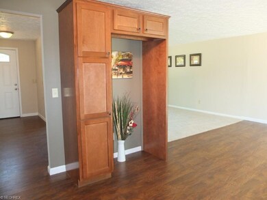 Kitchen is open to the dining room.