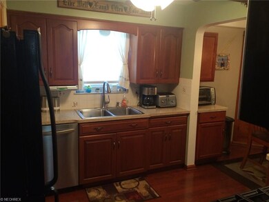 Kitchen features newer cabinets, newer floor, newer sink, disposal, stainless dishwasher. Refrigerator stays too.