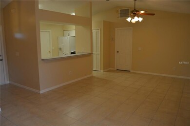 Living room / dining room combo is 13 x 23 feet.  Opens to breakfast bar / kitchen.