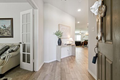 Hall featuring light wood-type flooring
