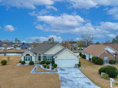 View of front facade featuring an attached garage,