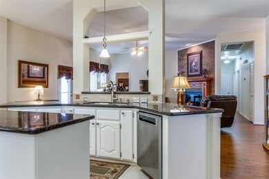 Open kitchen overlooking 2nd living area.