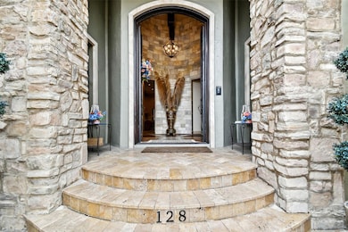 Welcome to 128 Biscayne - through your new front doors, the most awesome foyer awaits you