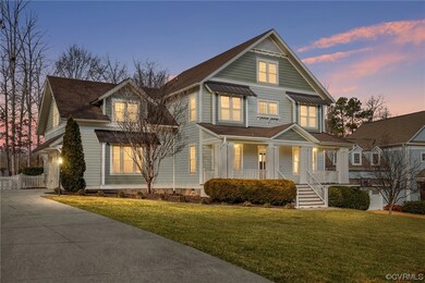 View of front facade featuring covered porch and a