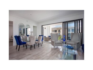 Dining/Living Room looking onto balcony.