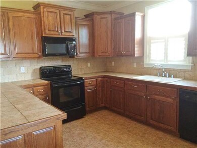 Kitchen. Look at the cabinets and counter space