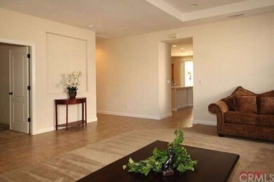 Entry into formal living and dining room