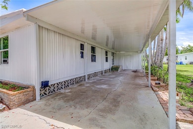 View of terrace featuring a carport