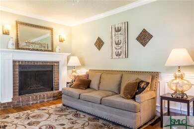 Bright, airy living room with cozy fireplace.