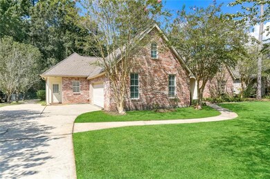 Front exterior, ample parking and two car garage s