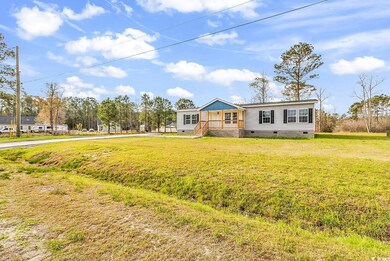 View of front of house featuring crawl space and a