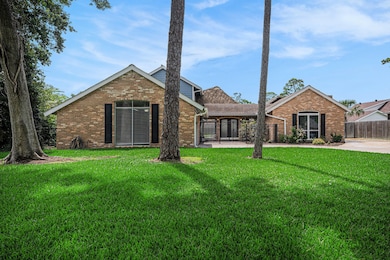 Wide driveway welcomes you home with ample parking