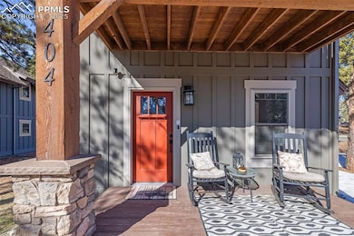 Property entrance featuring board and batten siding