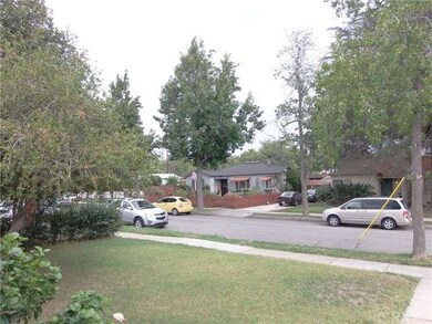 Standing on the front porch looking across the str