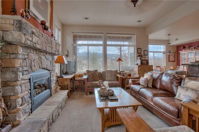 Spacious living room with efficient Mendota gas fireplace