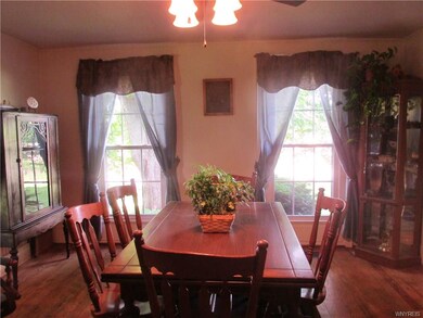 14x15 Formal Dining room features original hardwoo