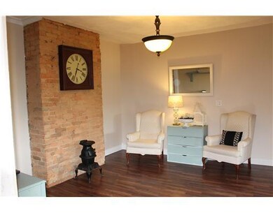 Den. Cozy den w/exposed brick...the perfect place 