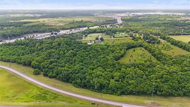 This shows the back of the property looking south.  On the left of the picture is Lexington Ave leading to Panasonic EV plant in the background.
