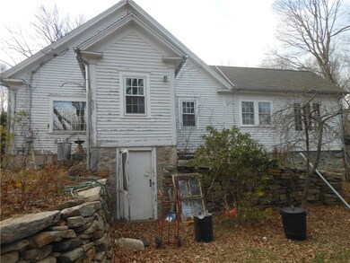 EXTERIOR RIGHT SIDE W/ WALKOUT BASEMENT