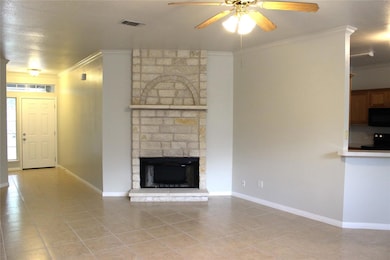 Unfurnished living room featuring light tile patt