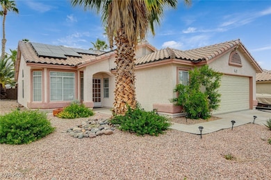 View of front facade featuring stucco siding, an a