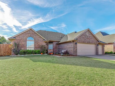 Single story home featuring a garage and a front l