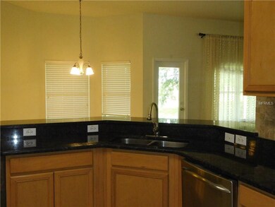 Kitchen overlooks dinette