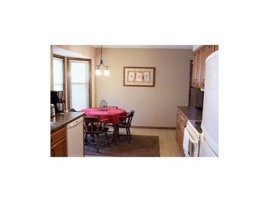 Kitchen has Eat-In Area with Bay Windows.