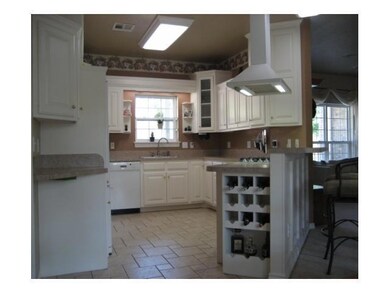 Kitchen. Custom kitchen with wine rack, breakfast 
