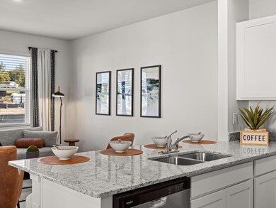 Pearson kitchen open to the living and dining area