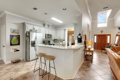 Kitchen with appliances with stainless steel finis