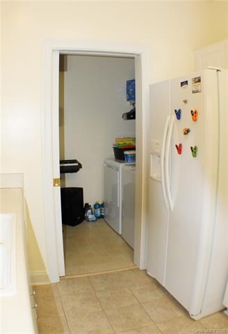 Laundry Room with sliding pocket door