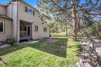 Back of the townhome with covered deck