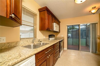 Kitchen with attached screen room