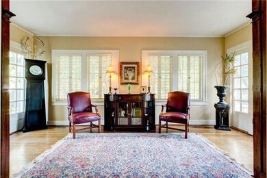 Bright Relaxing Sunroom off Living Room