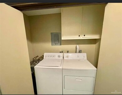 Washroom featuring washer and dryer