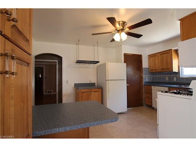 Convenient Breakfast Bar and All Appliances Remain