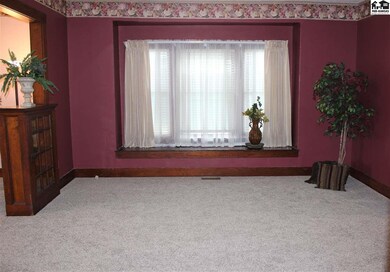 Dining room with window bench seating with storage