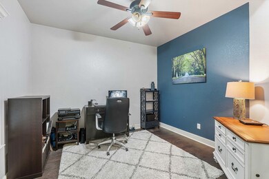 Office is conveniently situated just inside the entry of the home with outdoor views