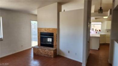 Unfurnished living room featuring a tile fireplace