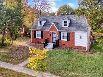 Cape cod-style brick-front house