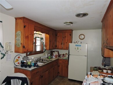 Kitchen w/ Knotty Pine Cabinets
