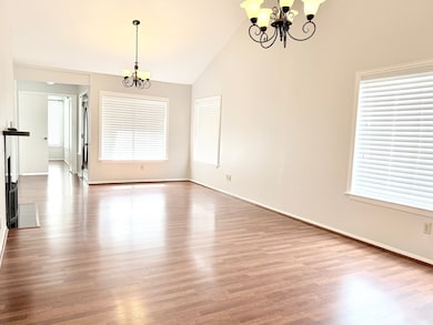 The light filled living room with high ceilings we